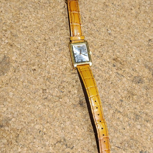 Casio women's watch used with brown leather strap
