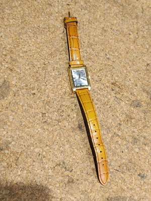 Casio women's watch used with brown leather strap