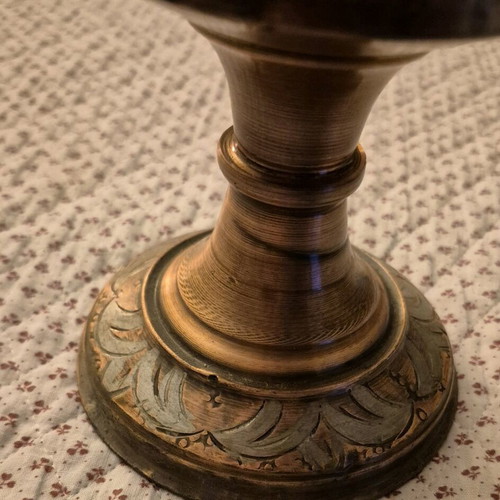 Brass antique oil lamp used with decorative engravings