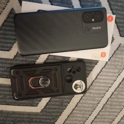 Redmi smartphone like new with box and protective case