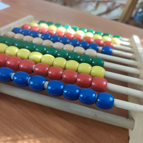 Wooden abacus with 10 colorful rows, educational toy