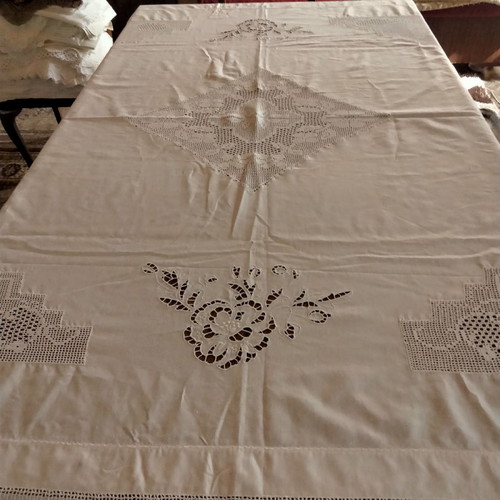 Handmade tablecloth used with knitted corners, lace and cutwork