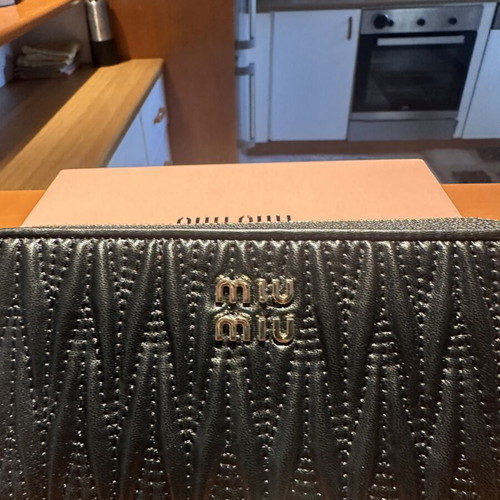 Miu Miu large black wallet like new with ample storage