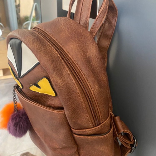 Monster Eyes backpack new leather 24x21 with pom-poms