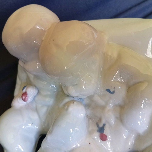 Porcelain figurine of twin babies like new