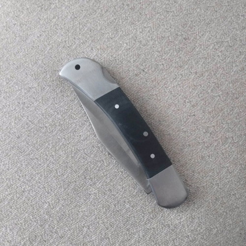 Metal folding knife with stainless blade like new