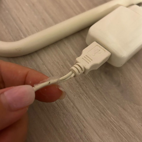 Minimalist white lamp with USB port used