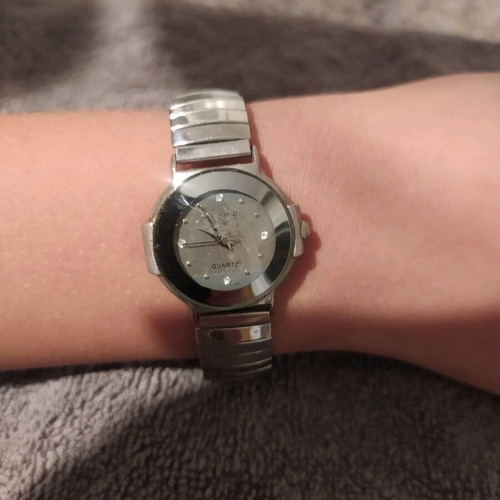 Women's watch used with elastic grey silver bracelet