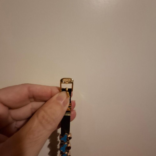 Black bracelet with blue decorations like new