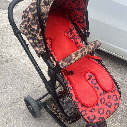 Cossato Leopard Stroller used with bassinet and accessories
