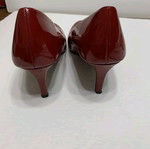 Red patent leather pumps