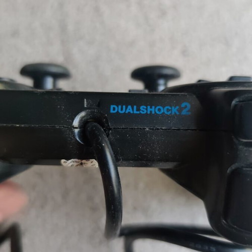 PlayStation 2 non-original controller used, functional