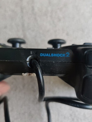 PlayStation 2 non-original controller used, functional