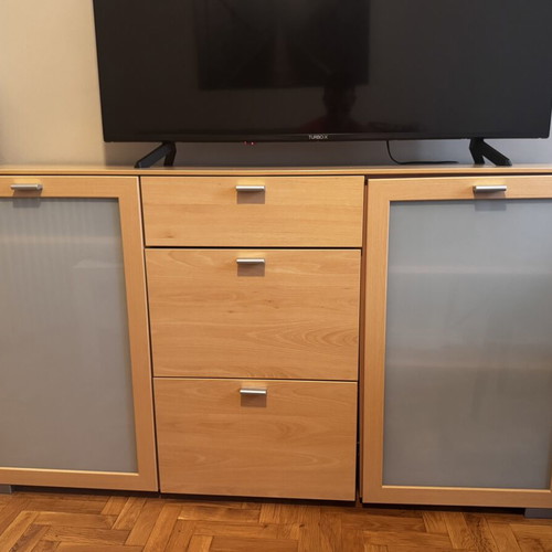 Wooden living room or bedroom furniture with drawers and cabinets