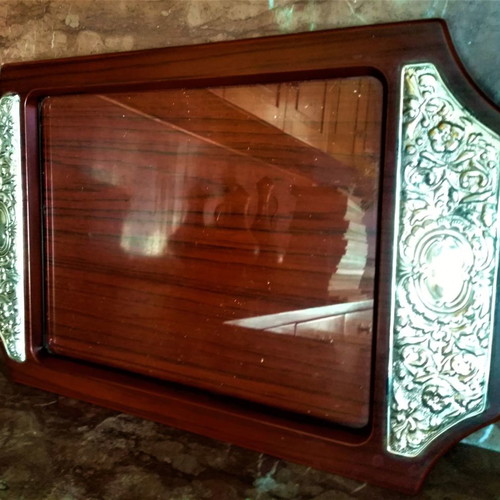 Wooden serving tray lacquered with silver embossed handles