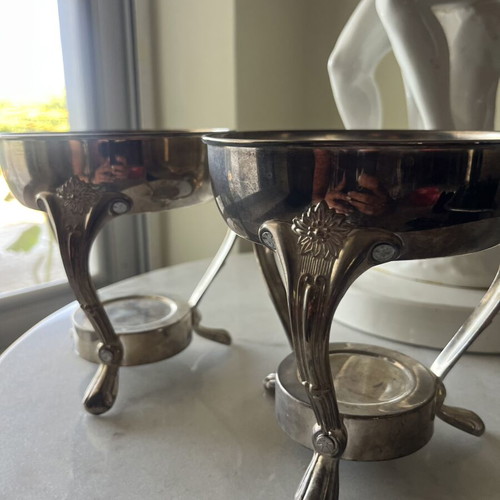 Vintage metal food warmer set with decorative legs and handles