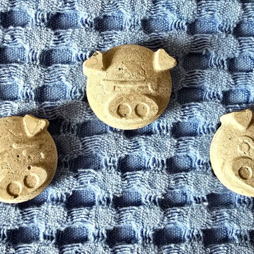 11 handmade concrete pig figurines with heart