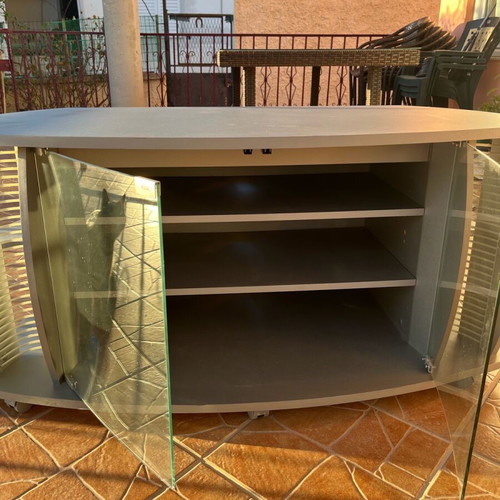 TV stand used with glass doors and rotating base