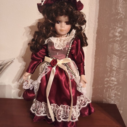 Porcelain doll, decorative, blue or burgundy