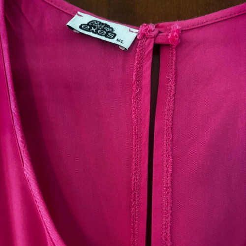 Pink one-piece shorts like new with belt size M