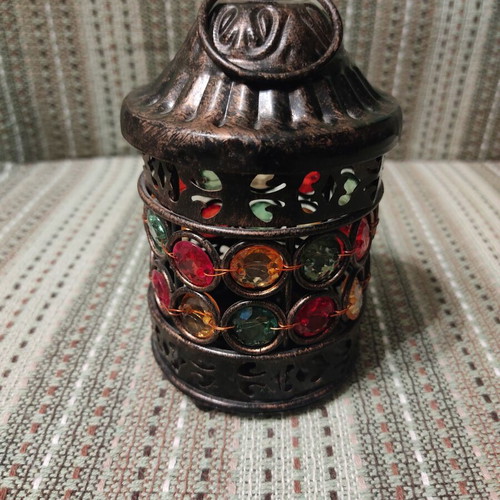 Metal lantern with colorful stones, ethnic style