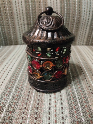 Metal lantern with colorful stones, ethnic style