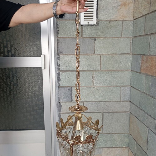 Vintage ceiling light used with brass details