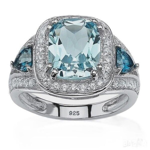 Aquamarine ring new, silver plated with white topaz