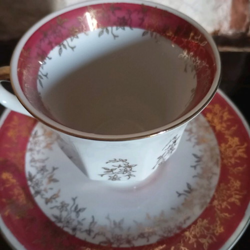 Porcelain tea set like new with gold details