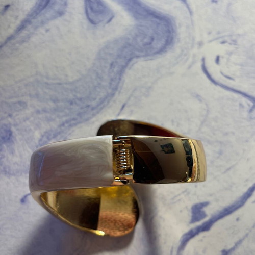 Gold and white bracelet new, opens and closes
