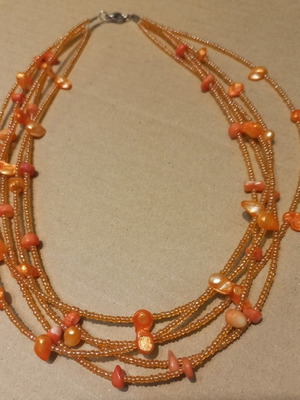 Handmade multistrand orange necklace with beads and coral stones like new