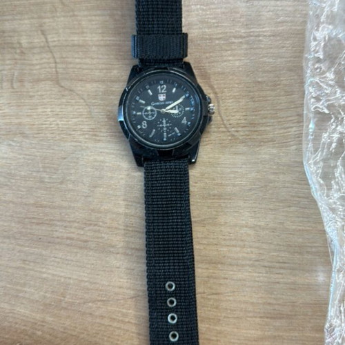 Watch new untested with minor case scratches, black