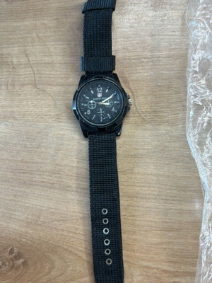 Watch new untested with minor case scratches, black