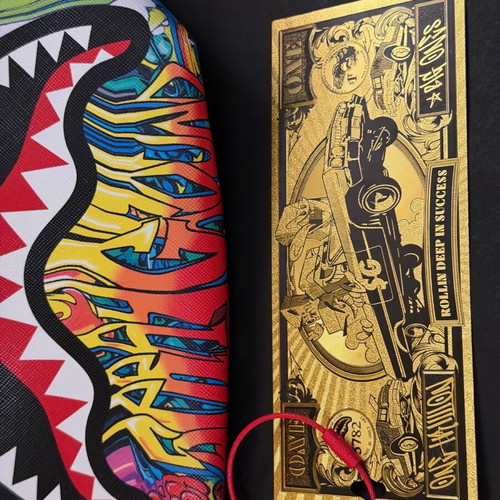 Sprayground Melt Graffiti crossbody bag like new, multicolor