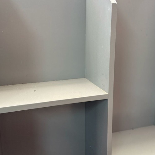 Shelf in gray color like new, modern with three vertical storage spaces