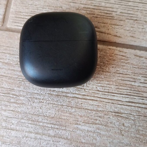 Redmi Buds 6 Lite earbuds used with scratches