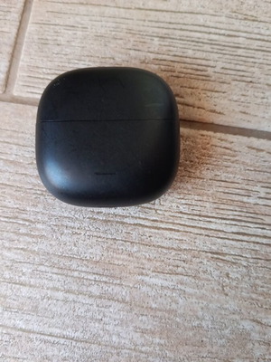 Redmi Buds 6 Lite earbuds used with scratches