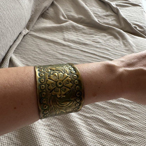Vintage wide brass cuff bracelet with embossed floral pattern, like new