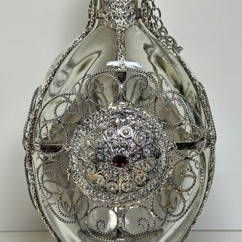 Vintage ornate handmade filigree glass bottle with red stones