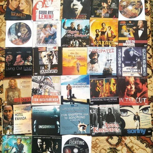 Pack of 48 used DVD movies with subtitles