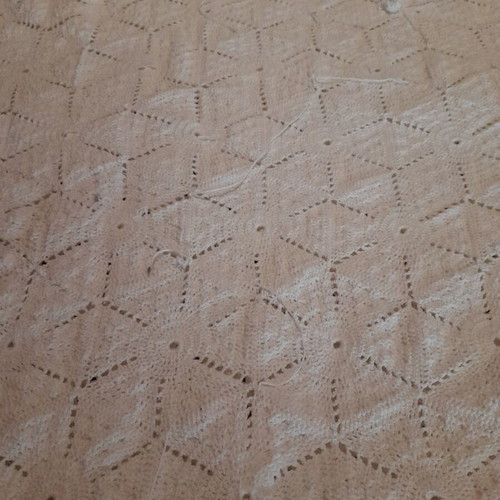Handmade white crochet blanket in vintage style