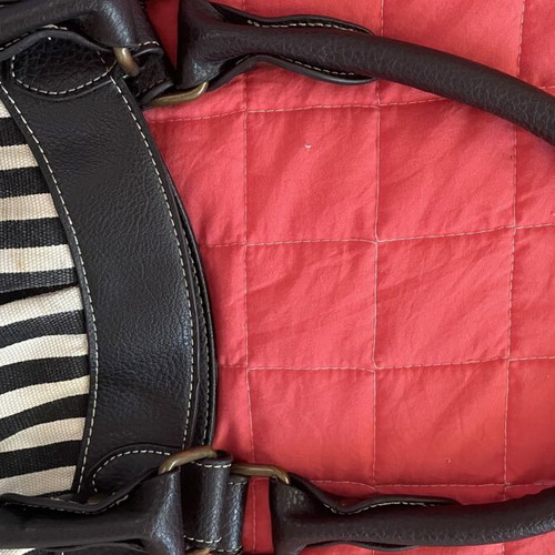 Oasis Handbag like new, black and white striped canvas with bronze details