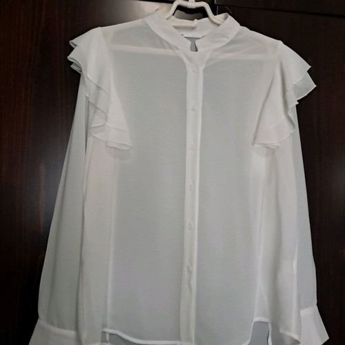 Semi-transparent white shirt with ruffle sleeve, size L, like new