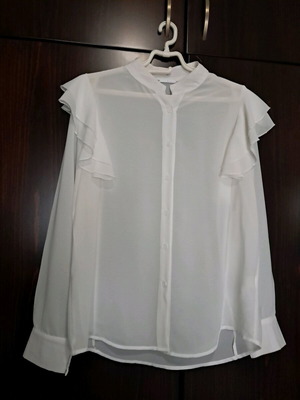 Semi-transparent white shirt with ruffle sleeve, size L, like new