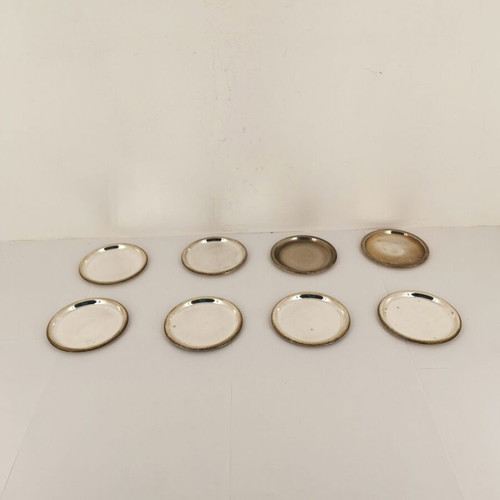 Set of 8 used metal coasters