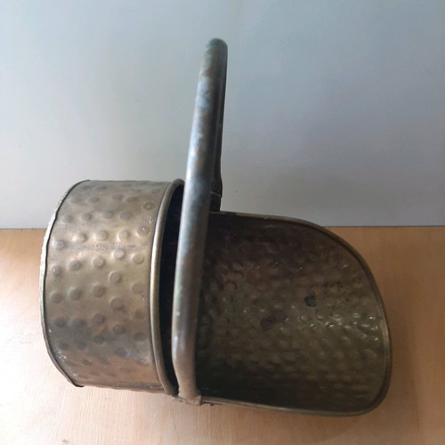 Copper coal scuttle used, hammered helmet style