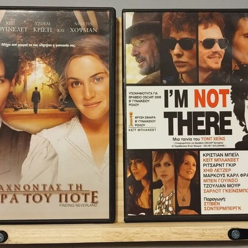 Pack of 4 DVDs used with crime, historical and biographical movies