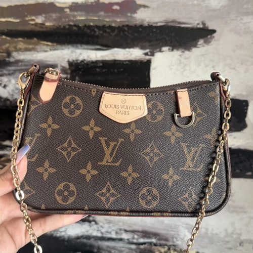 Louis Vuitton small handheld bag, leather, elegant