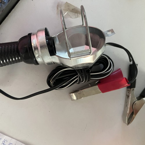 Portable work lamp 12V with metal cover and battery clips like new