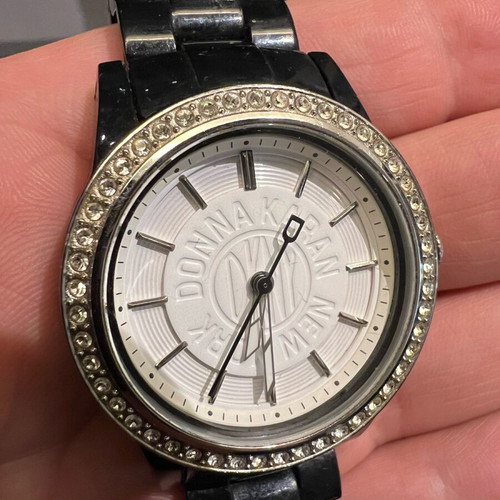 DKNY women's watch used with stones and black bracelet